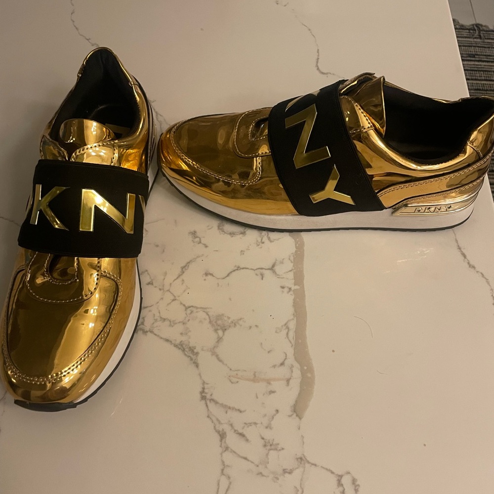 Metallic gold DKNY sneaker
